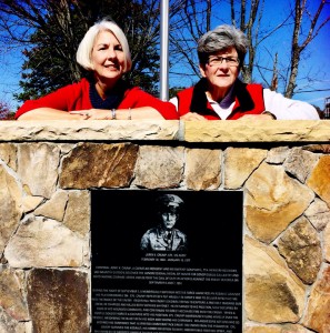 Sheila Waskow and Theresa Schwab at the plaque honoring their dad, Medal of Honor recipient Jerry Crump in Cornelius, NC