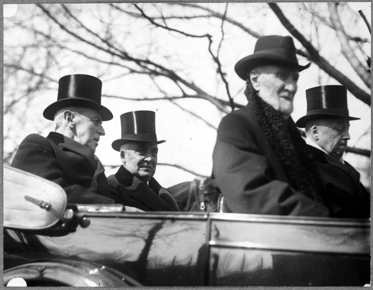 1921. Pres. Wilson and  and Pres-elect Harding going Harding Inauguration. First time an automobile was used for the ride (LOC)