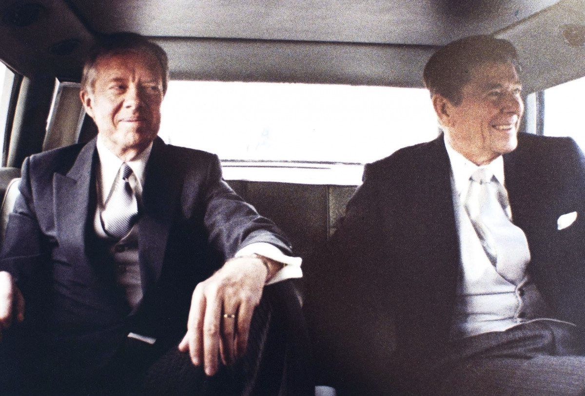 1981. Pres Jimmy Carter and Pres-elect Ronald Reagan on way to Capitol for inauguration (DHK Photo)