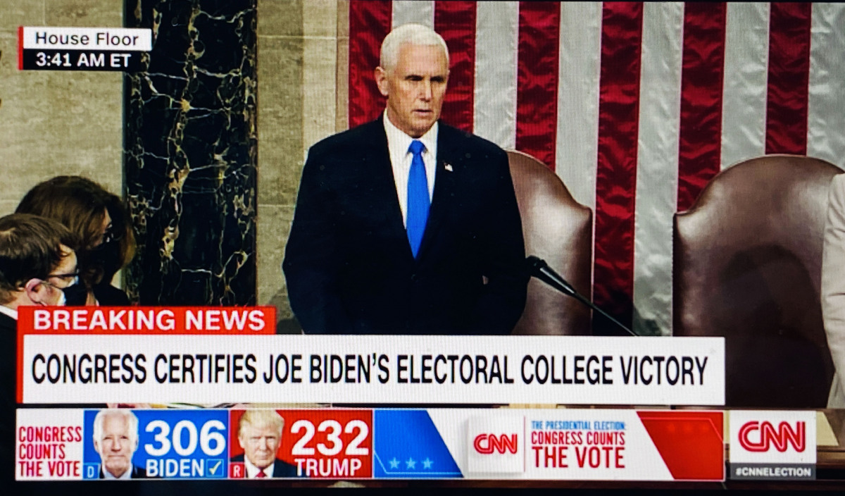 2021. VP Pence, showing that democracy still works, announces electoral college vote after riot at Capitol