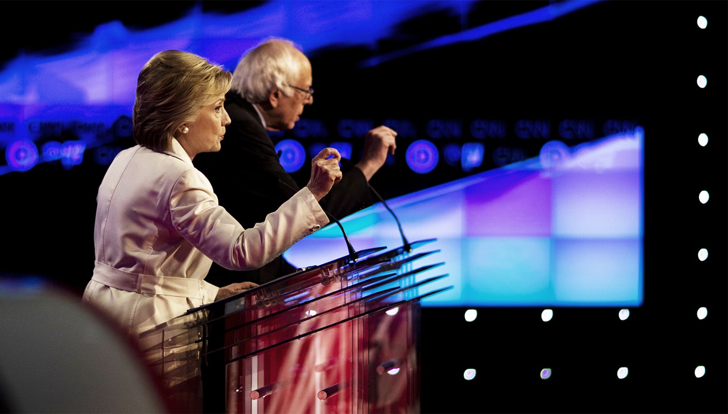 NEW YORK -- APRIL 14: Presidential candidates Hillary Clinton and Bernie Sanders debating at CNN Brooklyn Navy Yard Democratic Debate, New York, New York, April 14, 2016. (Photo by David Hume Kennerly/GettyImages)