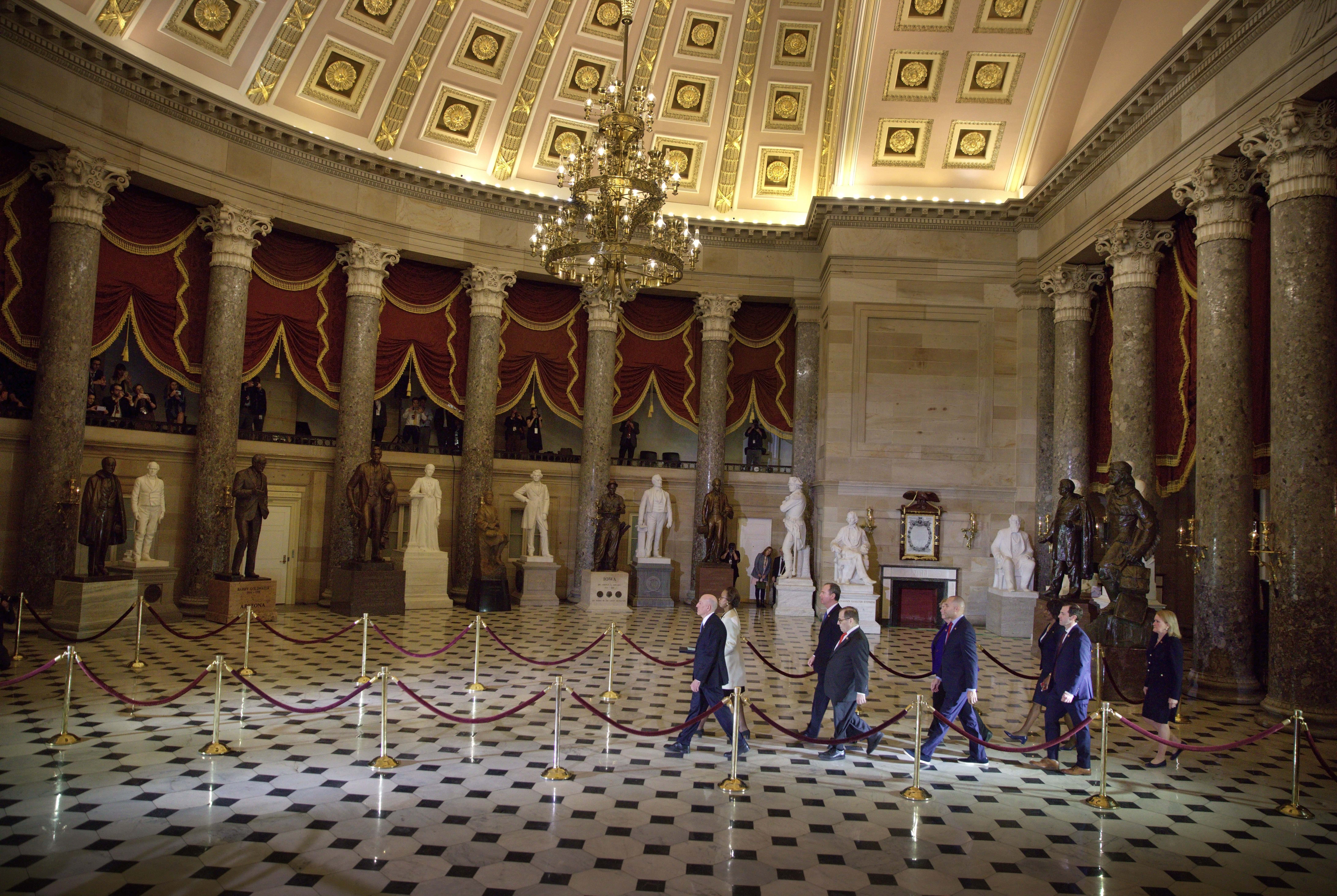 The seven House impeachment managers walk through Statuary Hall in the US Capitol to deliver the two articles of impeachment against President Trump to the Senate on Jan. 1, 2020. Center for Creative Photography, the University of Arizona: David Hume Kennerly Archive