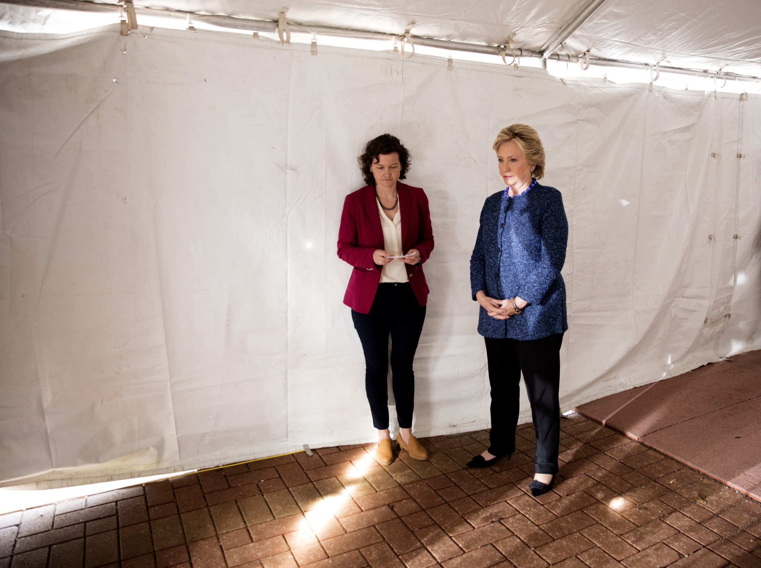 Clinton waits backstage in Cedar Rapids before her rally after hearing about the FBI reopening her email investigation, Oct. 28, 2016