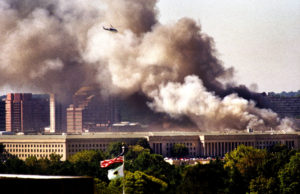 WASHINGTON Ñ SEPT 11: A U.S. Park Police helicopter flies by the Pentagon moments after a terrorist attack. Washington, D.C., September 11, 2001 (Photo by David Hume Kennerly/Center for Creative Photography/University of Arizona)