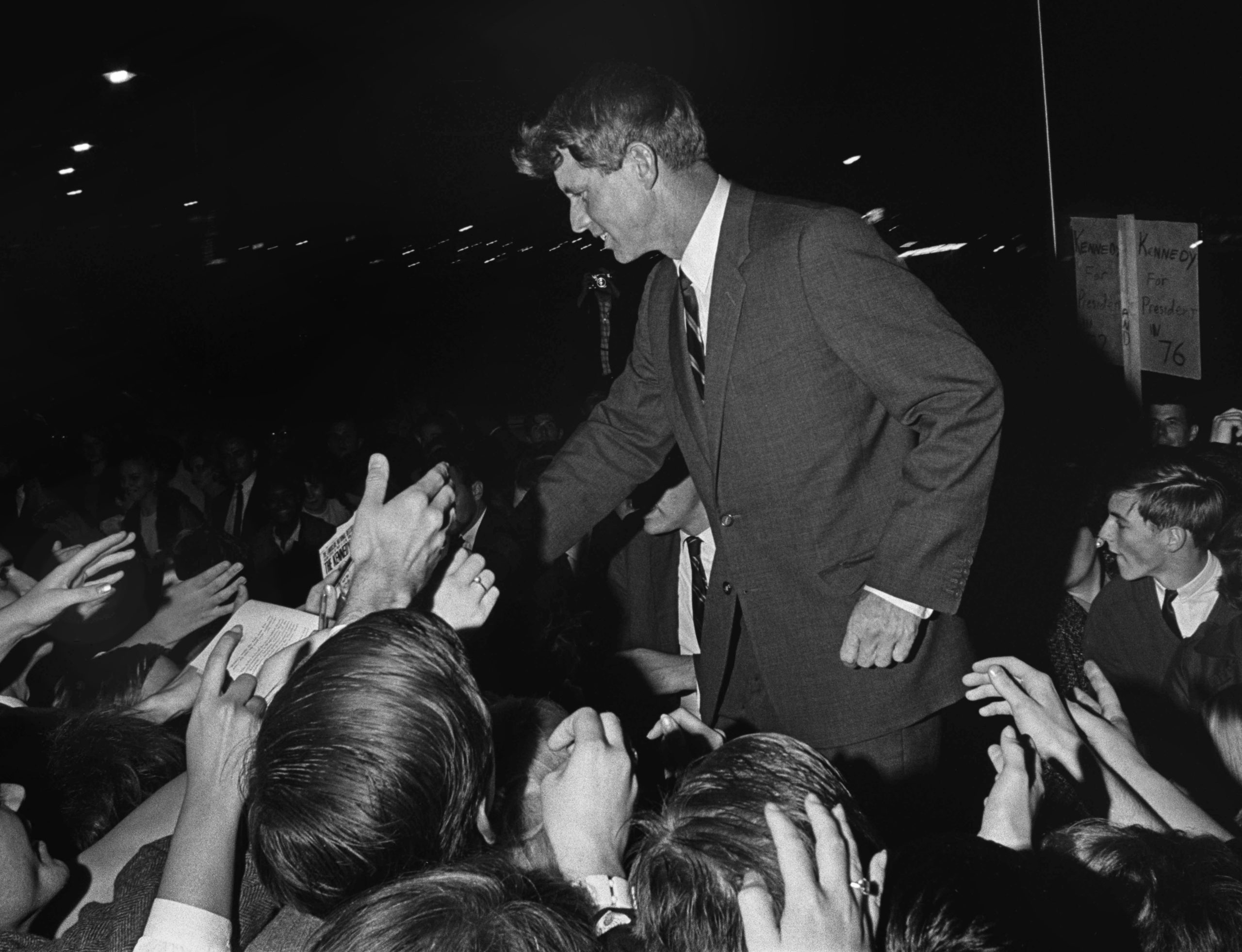 Sen. Robert F. Kennedy in crowd at Portland Airport, 1966
