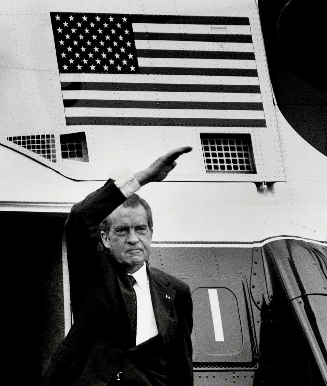 President Richard Nixon waves goodbye from his helicopter after resigning, August 9, 1974