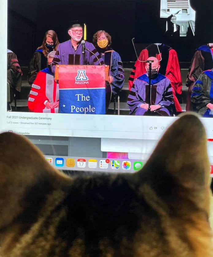 A scholarly cat watches Kennerly's commencement address. (Photo by John Rodrigues).