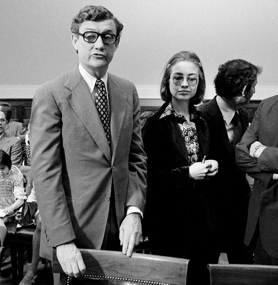WASHINGTON -- 1974: Hillary Rodham, a young lawyer advising the Rodino Committee stands next to chief lawyer John Doar during impeachment proceedings against President Nixon in the House Judiciary Committee Room, 1974 (photo by David Hume Kennerly/GettyImages)