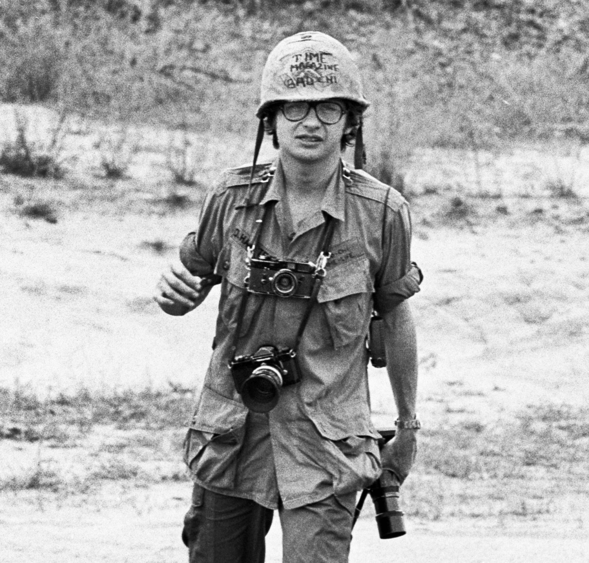 Dirck Halstead in Hanoi with his camera and in full military gear