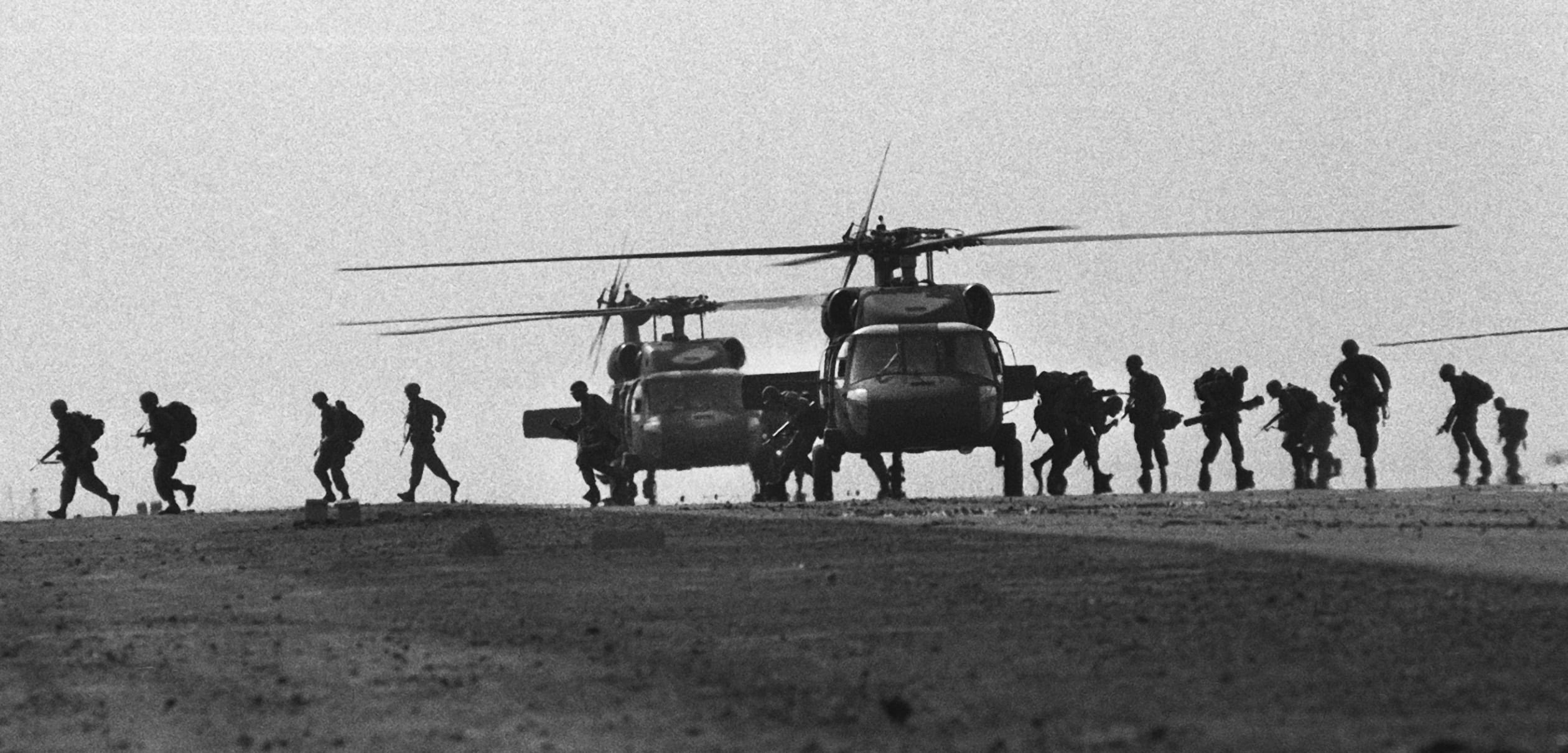 Troops run off U.S. helicopters during attack on Granada (U.S. Dept. of Defense photo)