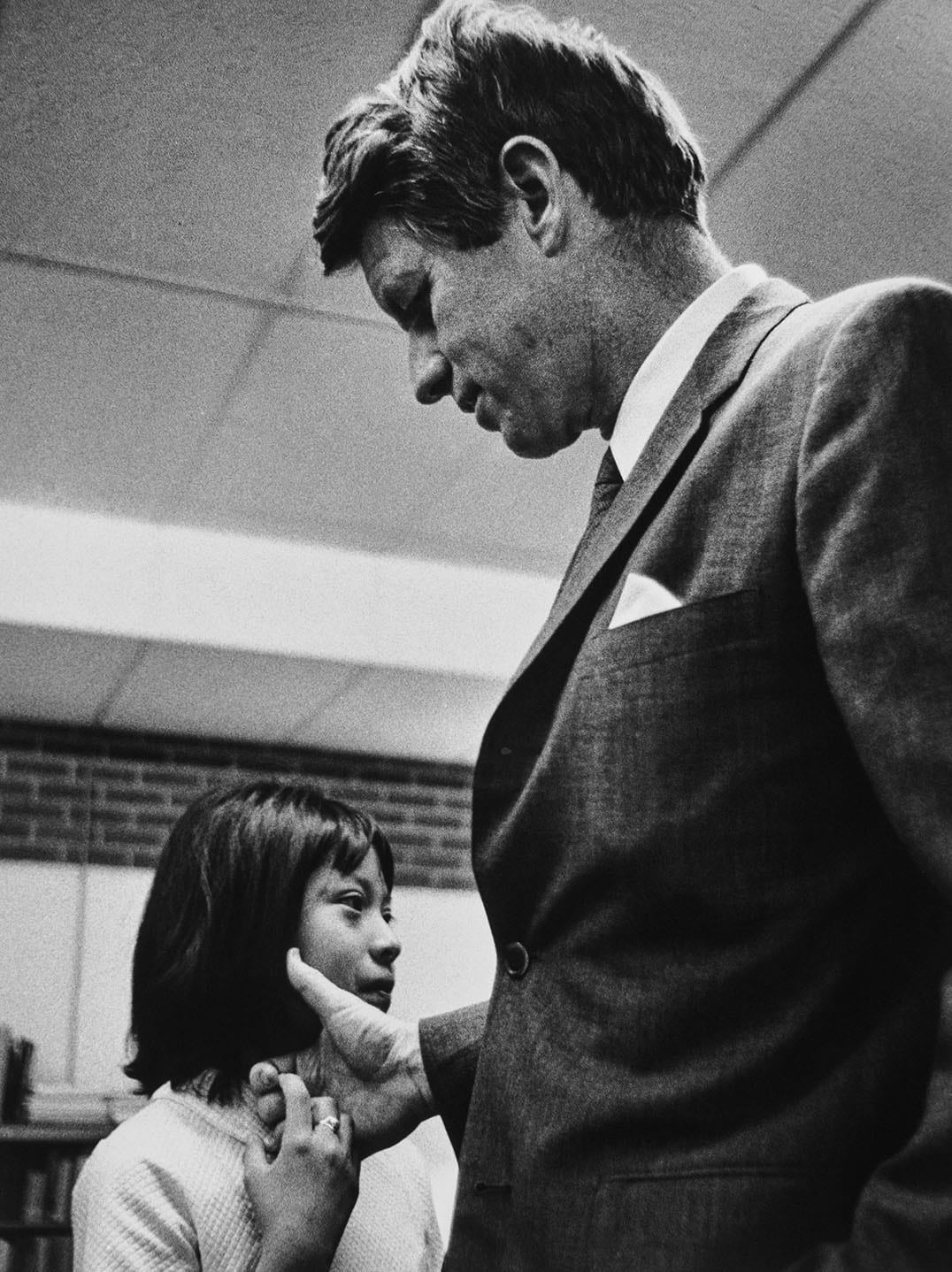 Sen. Robert Kennedy with Native American girl, Window Rock, AZ