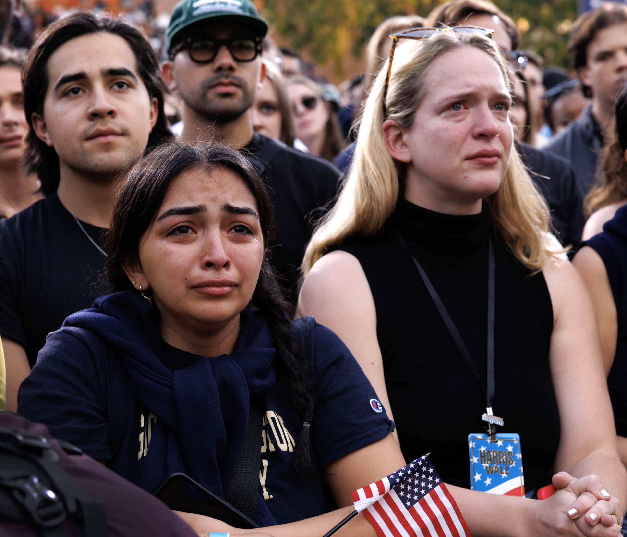 Dejected faces in the crowd as Harris gives her concession speech