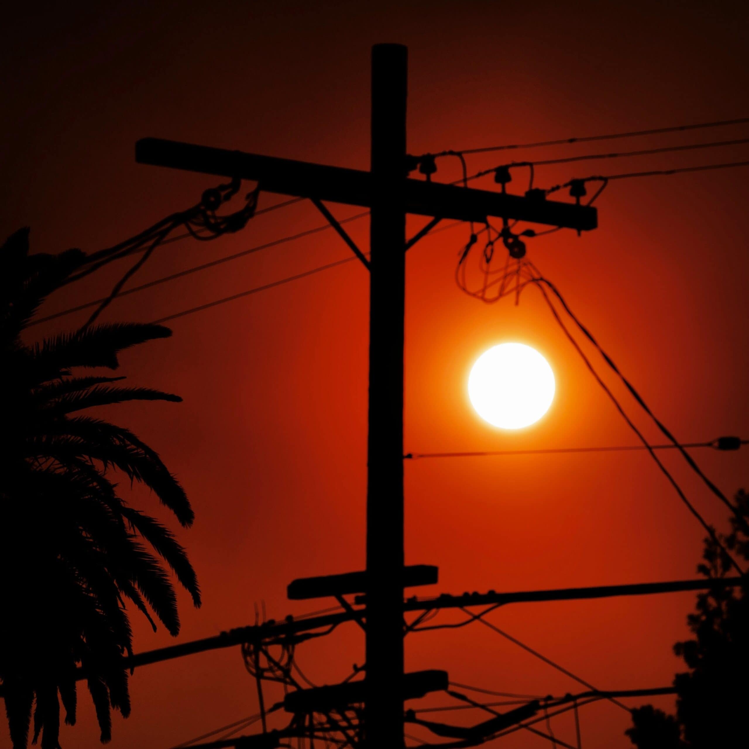 The smoky red afternoon sky seen from mid-city L.A. caused by the Palisades Fire