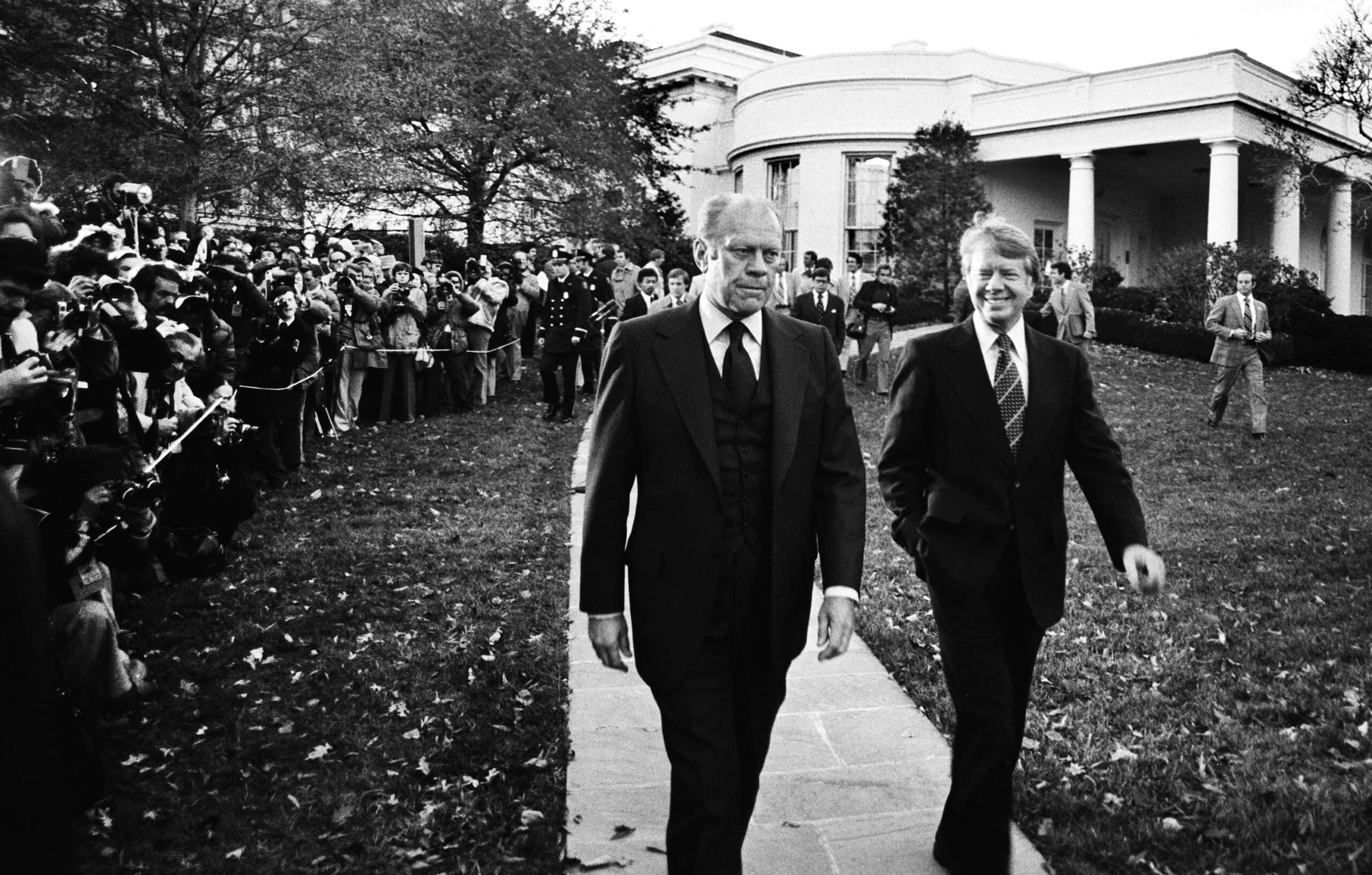 Carter and Ford walk from Oval Office