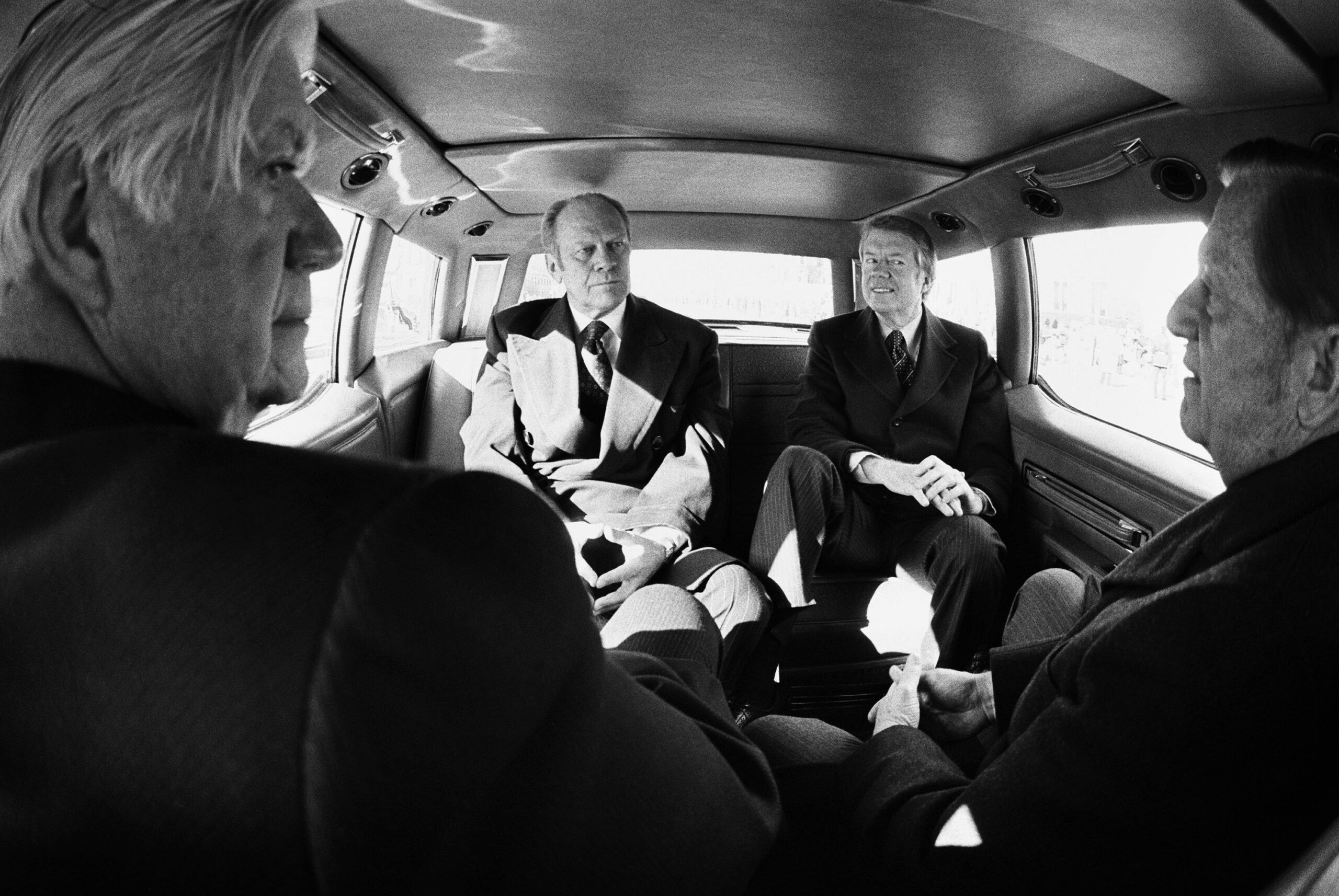 President Ford and President Carter during their “uncomfortable ride” to the Capitol