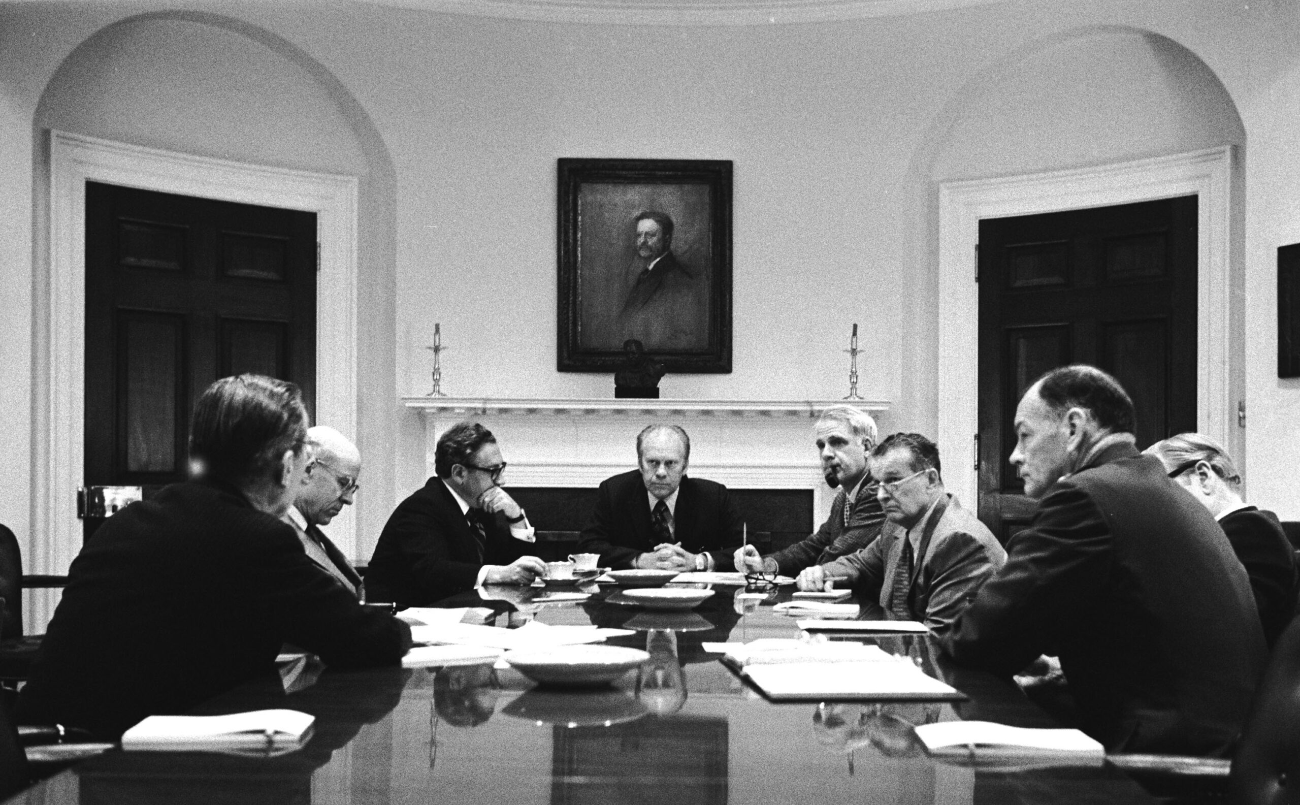 At a meeting of the National Security Council in the Roosevelt Room, Ford makes the decision to continue to evacuate Americans and high risk Vietnamese from Vietnam from Saigon's Tan Son Nhut Airport. Also in the meeting, (from left), CIA Director William Colby, Deputy Secretary of State Robert Ingersoll, Secretary of State Henry Kissinger, Secretary of Defense James Schlesinger, Deputy Secretary of Defense Bill Clements, Vice President Nelson Rockefeller, and Chairman of the Joint Chiefs of Staff General George Brown. Two hours later the president ordered the final evacuation of Americans and Vietnamese, signaling the end of the Vietnam War.